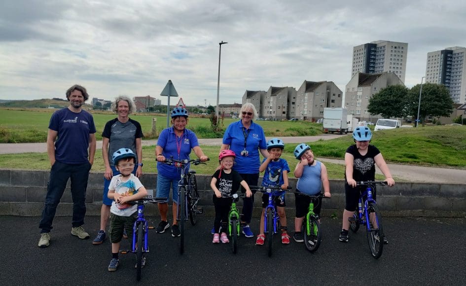 Family learning bike team photo